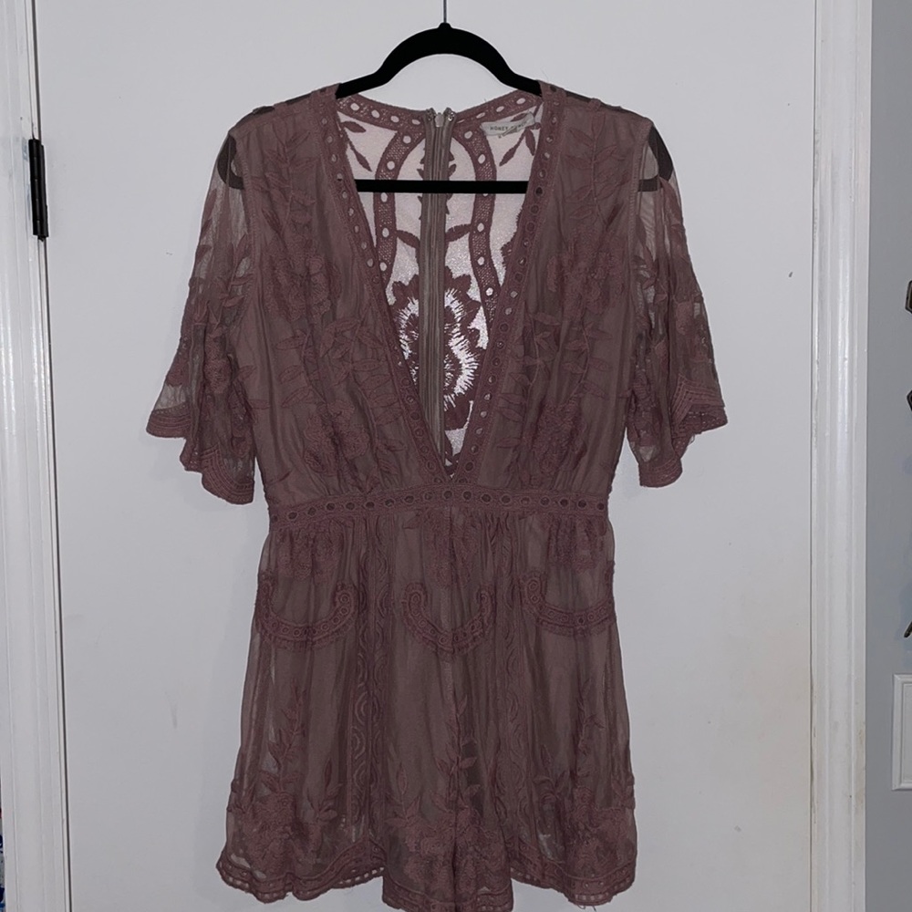 Deep V Summer Romper in a light lavender shade with mesh and lace detail.
